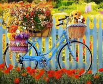 Щенки в корзине велосипеда с цветами